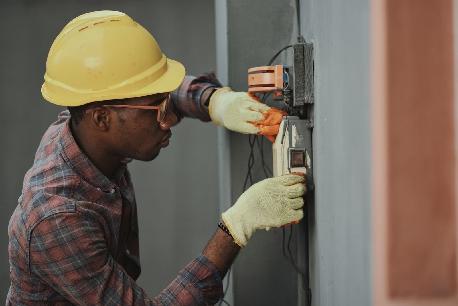 Field service professional with yellow hard hat